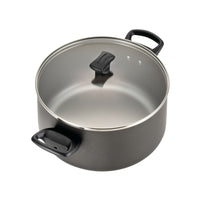 A sleek addition to any kitchen, the 15-Piece Nonstick Cookware Set includes a pot with a glass lid and sturdy black handles. Crafted from durable aluminum, it ensures even heat distribution, making it perfect for all your culinary adventures.