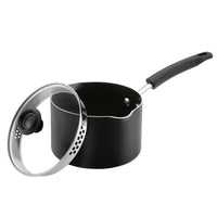Introducing the 3-Quart Nonstick Straining Saucepan, featuring a black nonstick design with a lid and a black handle. Expertly crafted for convenience, this sleek saucepan is dishwasher safe to ensure easy clean-up, all presented against a crisp white background.