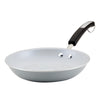 The 10-Inch Recycled Aluminum Ceramic Nonstick Frying Pan, designed in gray, includes a black handle and hanging loop. Additionally, it is dishwasher safe for convenient cleaning.
