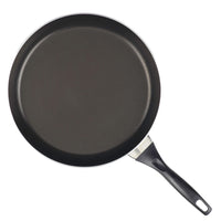 Part of the 15-Piece Nonstick Cookware Set, this sleek black frying pan is crafted from durable aluminum and features a long handle for convenient use.