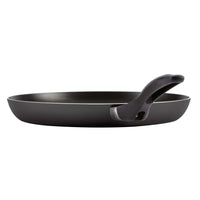 Part of the 15-Piece Nonstick Cookware Set, this stylish black frying pan is expertly crafted from aluminum and features a curved handle, beautifully presented against a crisp white background.