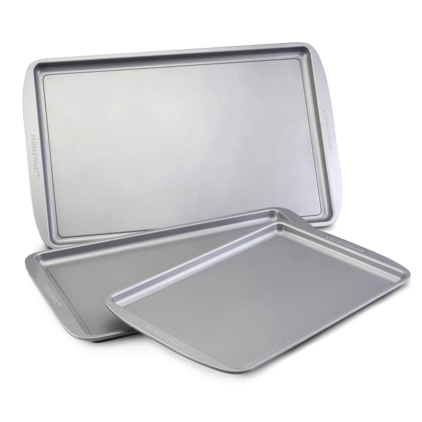 A stack of three pans from the 3-Piece Cookie Pan Set, with a heavy-duty construction and nonstick surface for effortless cleanup.
