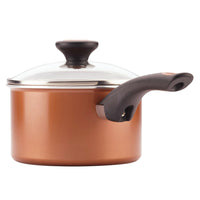 Introducing the 12-Piece Copper Ceramic Nonstick Cookware Set, showcasing CopperSlide technology with a sleek black handle and a clear glass lid, all set against a white background. Dishwasher safe, this cookware set beautifully blends elegance and functionality for an effortless cooking experience.