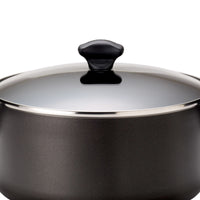 The 15-Piece Nonstick Cookware Set, featuring a black aluminum pot with a nonstick finish, lid, and handle, is a versatile addition to any cookware collection.