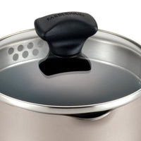 A detailed view of the Nonstick Saucepan with Straining Lid, featuring a durable black handle and steam holes, highlighted by its dishwasher safe design.