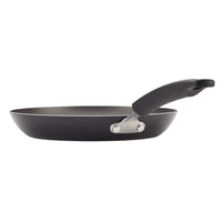 A side view of a black nonstick frying pan from the 10.5" & 12" Nonstick Frying Pan Set by Farberware, featuring an easy-clean surface and handle.