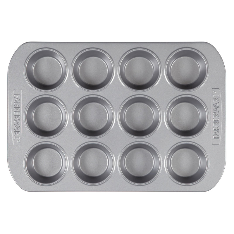 A top-down view of a silver-finished Muffin Pan, designed for baking 12 blueberry muffins.
