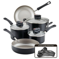 A 14-piece set of black and silver non-stick pots, pans, and kitchen utensils featuring Farberware Smart Control with advanced steam vent technology.