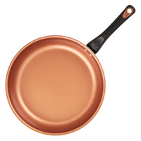 From above, the copper-colored frying pan with a black handle from the 12-Piece Copper Ceramic Nonstick Cookware Set highlights its CopperSlide technology for exceptional nonstick performance and is dishwasher safe for easy maintenance.