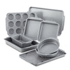 The 10-Piece Nonstick Bakeware Set, featuring assorted gray baking pans and trays with a nonstick coating for effortless food release, is neatly arranged on a white background.