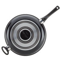 The 12.5-Inch Copper Ceramic Nonstick Deep Frying Pan showcases a black handle and a sleek silver bottom, featuring advanced technology as seen from above.