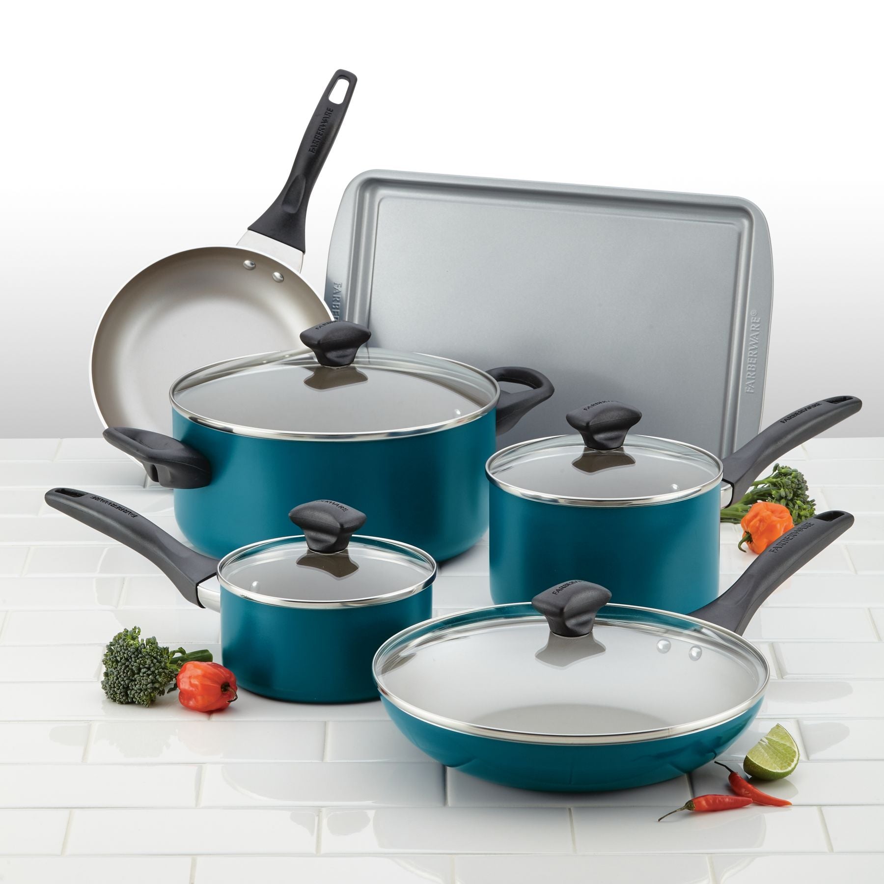 The 15-Piece Nonstick Cookware Set features premium aluminum pots, nonstick pans, lids, a baking tray, and even vegetables to inspire your culinary adventures.