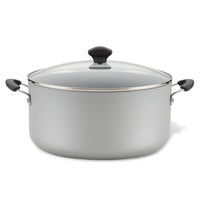 Introducing the 10.5-Quart Nonstick Stockpot: a spacious gray pot featuring a glass lid and sleek black handles, ideal for cooking family-sized meals.