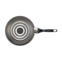 Part of our premium 15-Piece Nonstick Cookware Set, this aluminum frying pan with a black handle is showcased from an overhead view.